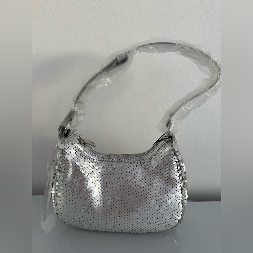 Nicole Miller silver sequined bag, new with tags.